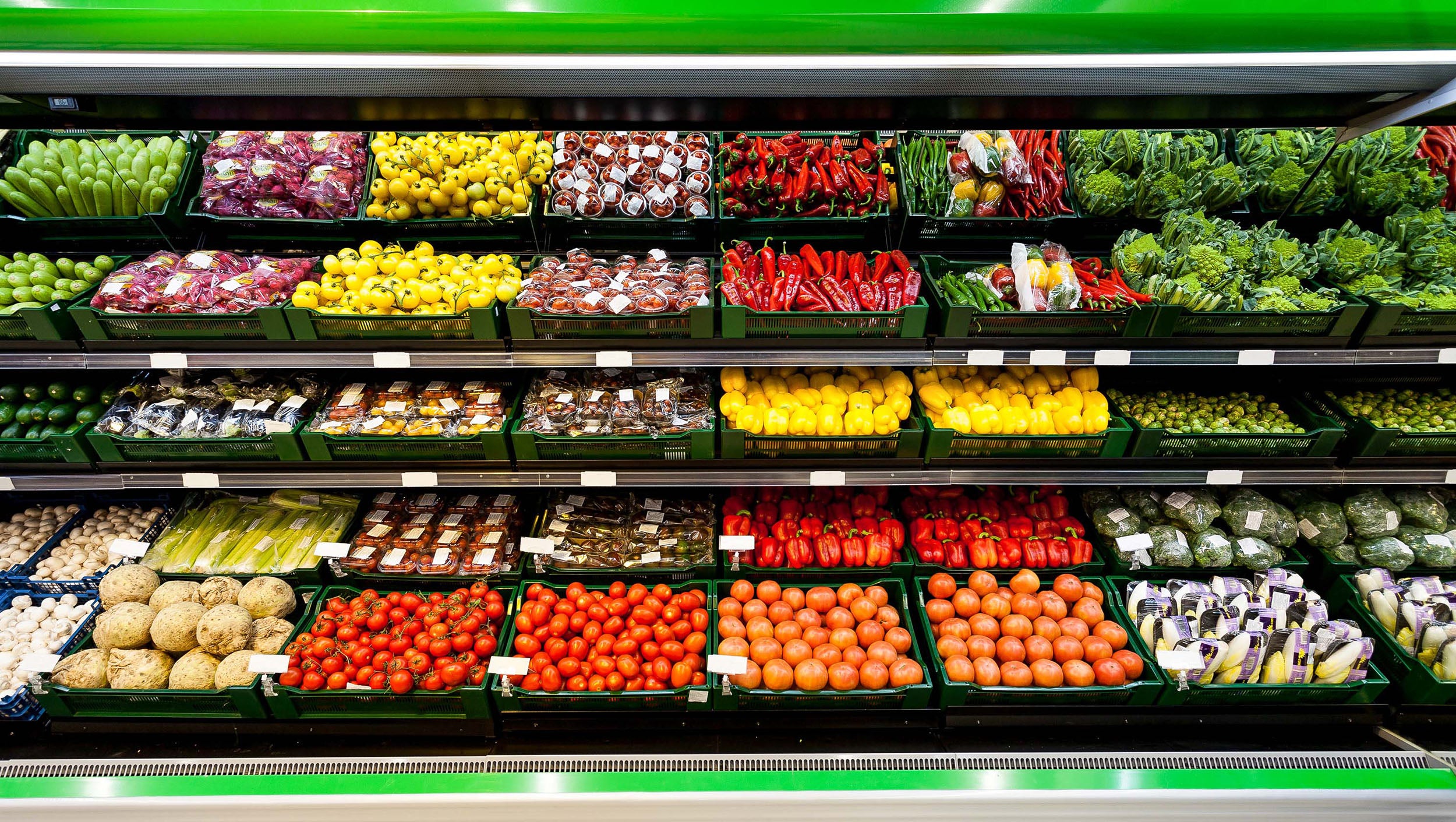 Produce line supermarket shelves.